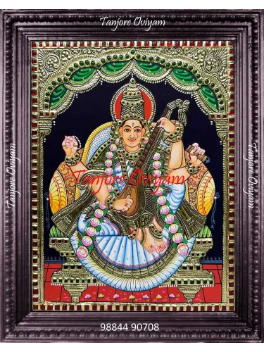 Goddess Saraswathi Tanjore painting with veena, jewellery and gold foil detailing